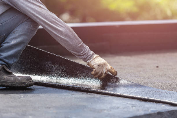 Professional Waterproofing technician working in Edgewater, NJ